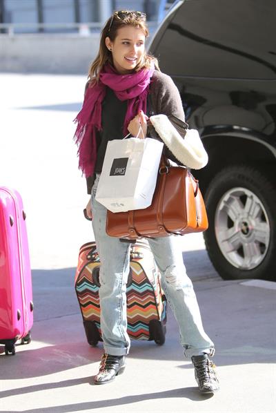 Emma Roberts departing on a flight at LAairport in Los Angeles, California on December 22, 2012 