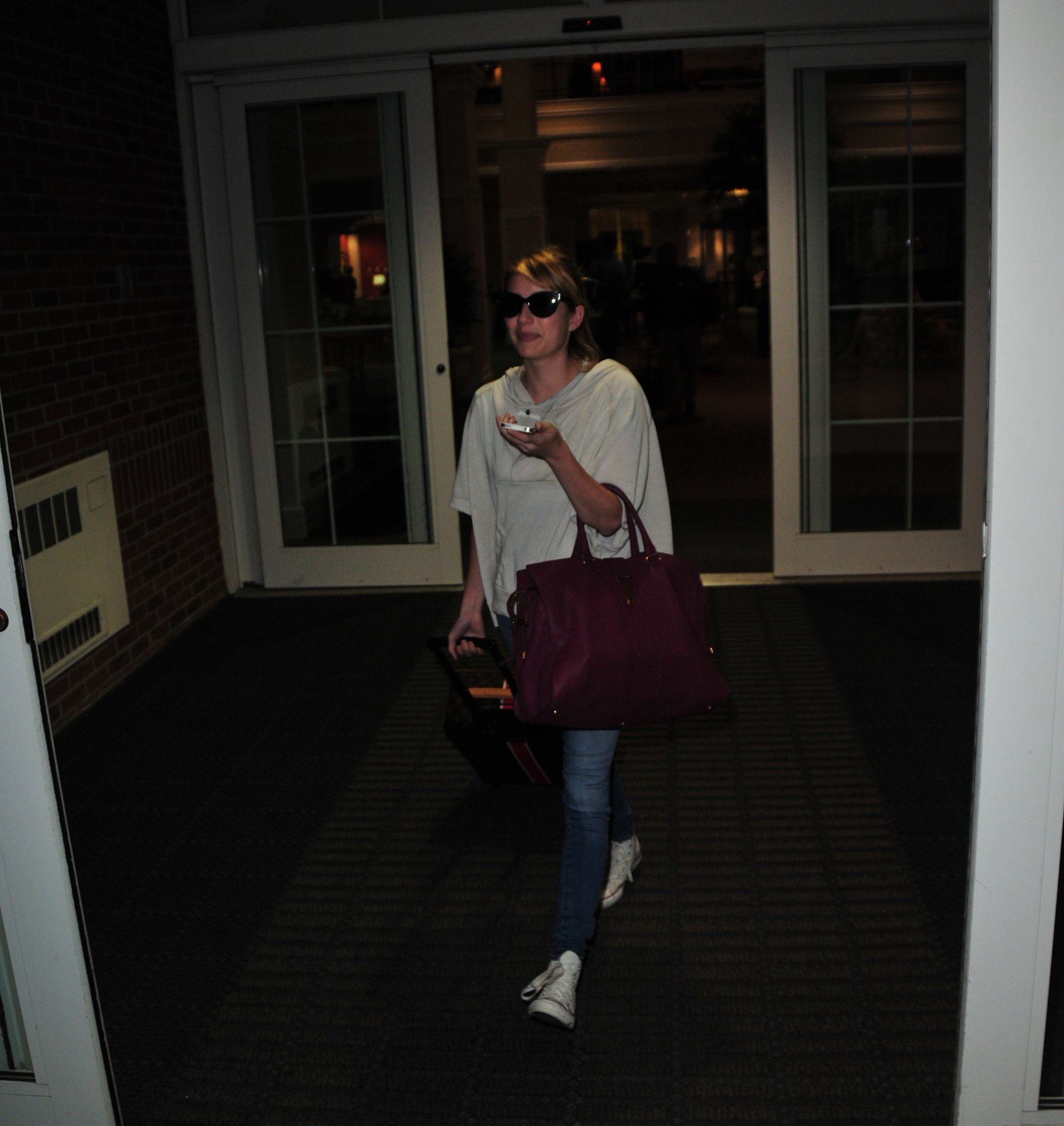 Emma Roberts lands in Wilmington to continue filming 'We're the Millers' (09 August 2012)