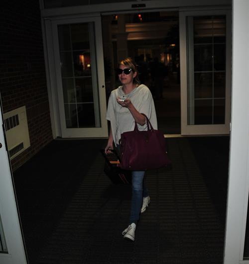 Emma Roberts lands in Wilmington to continue filming 'We're the Millers' (09 August 2012)