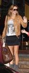 Geri Halliwell leaves The Sheraton On The Park Hotel in Sidney on June 26, 2013