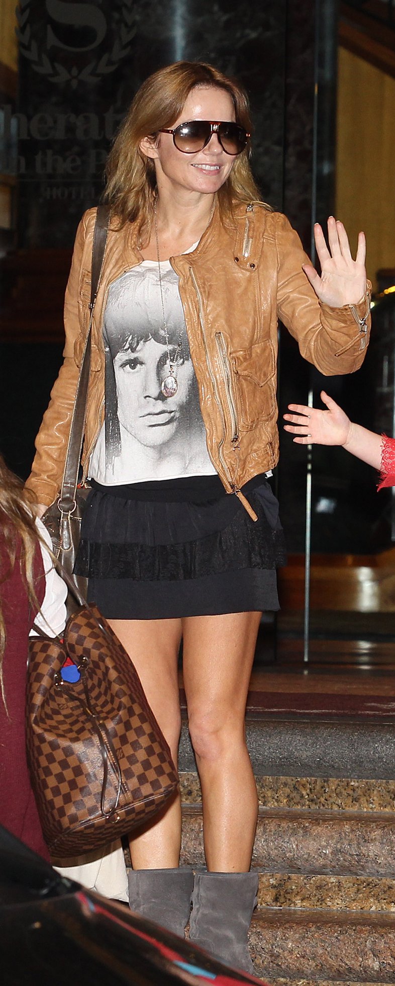 Geri Halliwell leaves The Sheraton On The Park Hotel in Sidney on June 26, 2013