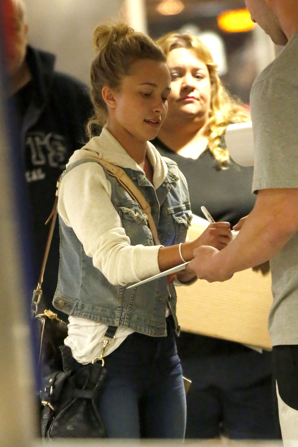 Hayden Panettiere arriving at LAX Airport and signing autographs on May 29, 2013