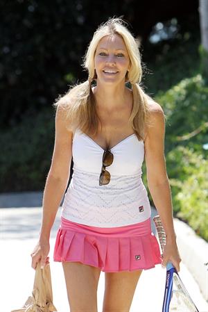 Heather Locklear - Playing with a pink dress Tennis in Malibu (Aug 1, 2012)