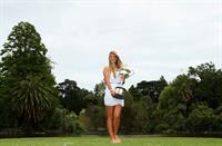 Victoria Azarenka poses with Memorial Cup after winning the 2013 Australian Open January 27, 2013 
