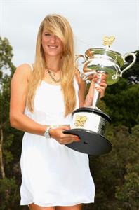 Victoria Azarenka poses with Memorial Cup after winning the 2013 Australian Open January 27, 2013 