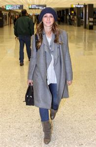 Jennifer Love Hewitt arrives on a flight at Dulles Airport in Washington, D.C. 12/22/12 