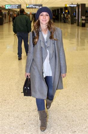 Jennifer Love Hewitt arrives on a flight at Dulles Airport in Washington, D.C. 12/22/12 