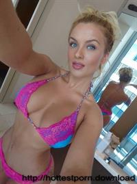 Anonymous in a bikini taking a selfie