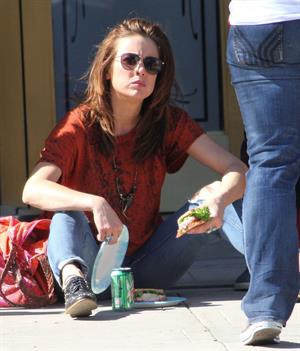 Jessica Stroup takes a break on the set of 90210 in Los Angeles on February 26, 2013