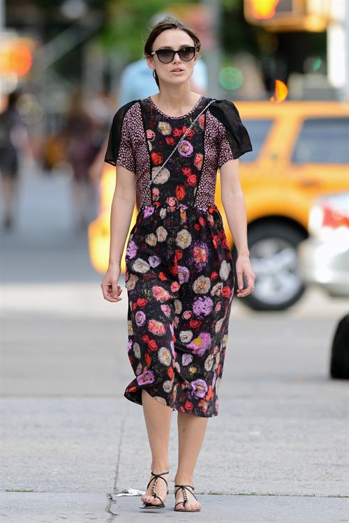 Keira Knightley wears a dark floral dress while strolling in New York City on August 7, 2012