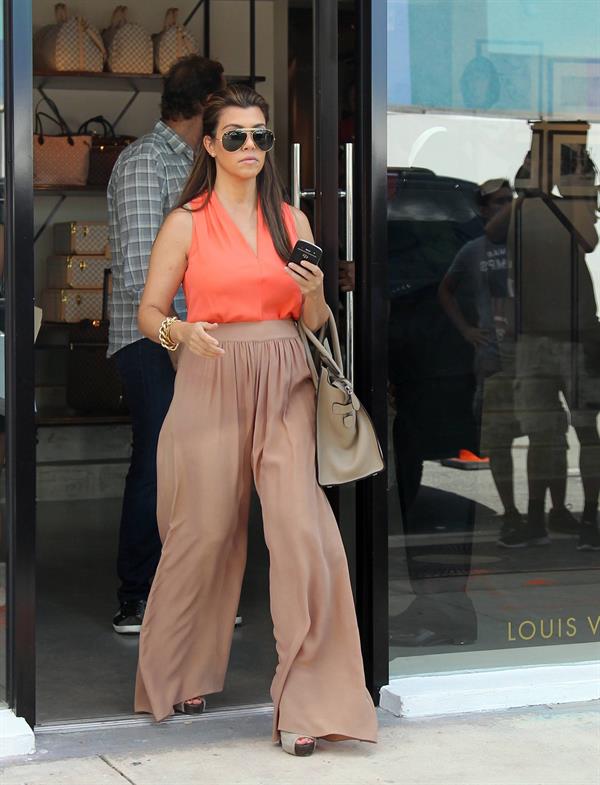 Kourtney Kardashian Leaving Sugarcane Restaurant with Scott Disick after lunch in Miami (October 22, 2012) 