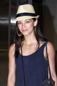 Kristin Kreuk - Pearson International Airport arrival candids in Toronto (July 16, 2012)