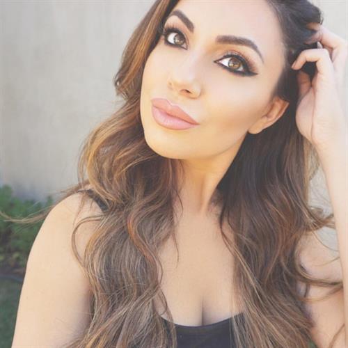 Uldouz Wallace taking a selfie