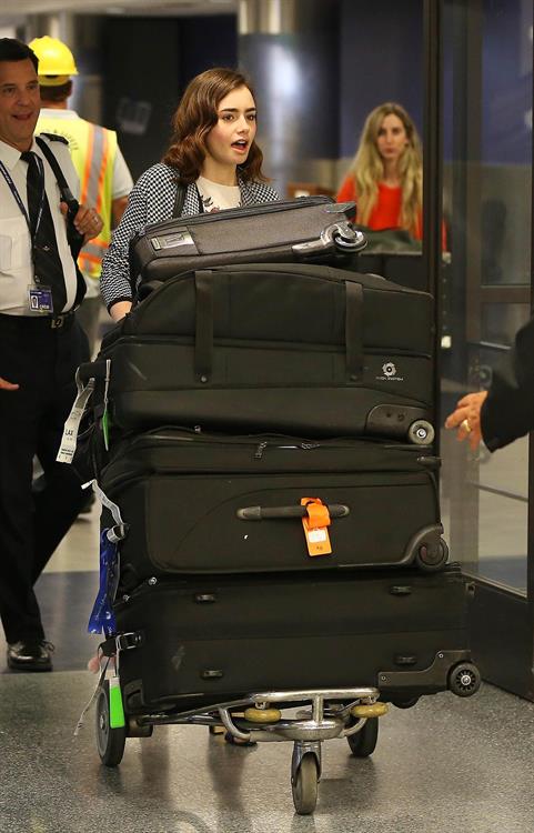 Lily Collins Pictures Lily Collins - LAX Airport 8/27/13