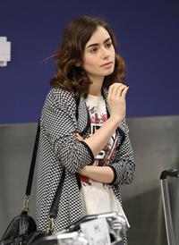 Lily Collins - LAX Airport 8/27/13