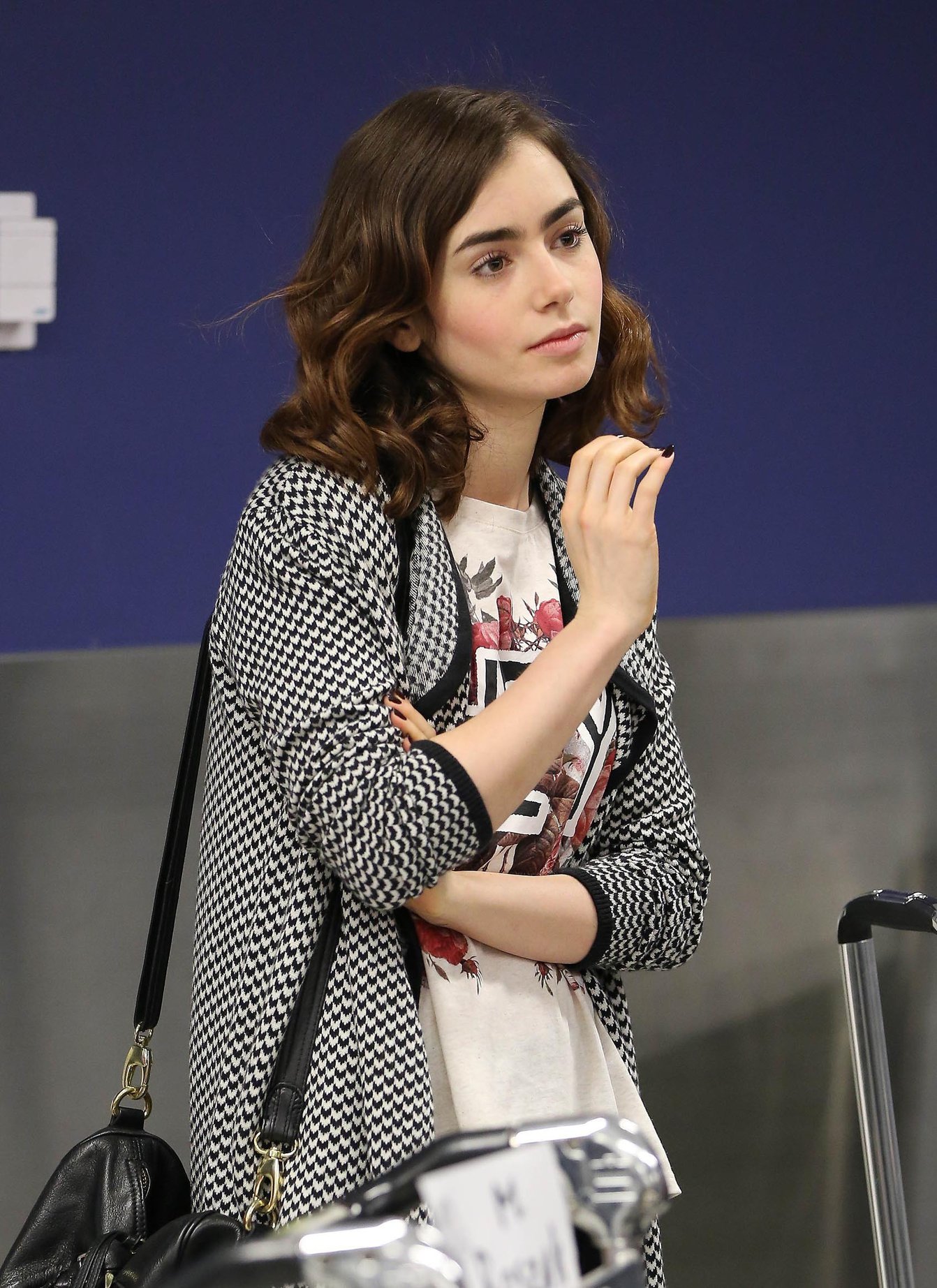 Lily Collins - LAX Airport 8/27/13