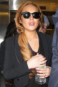 Lindsay Lohan - Los Angeles International Airport (10.04.2013) 