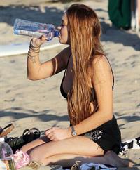 Lindsay Lohan - arriving to the beach in Malibu - August 12, 2012