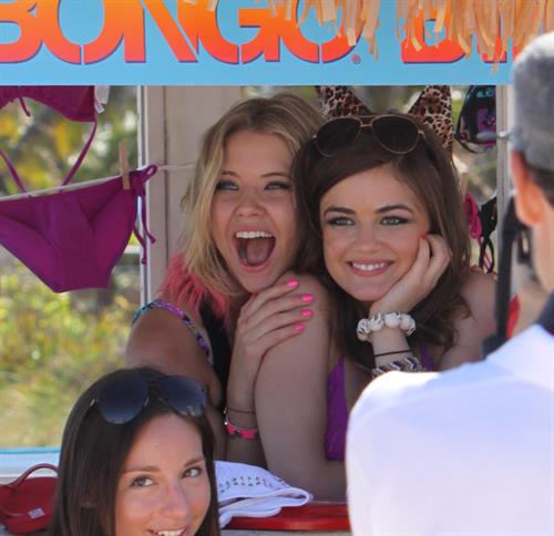 Lucy Hale Bikini Pictures Lucy Hale and Ashley Benson photoshoot at the Bondo Bikini Shack on Miami Beach on March 24, 2012