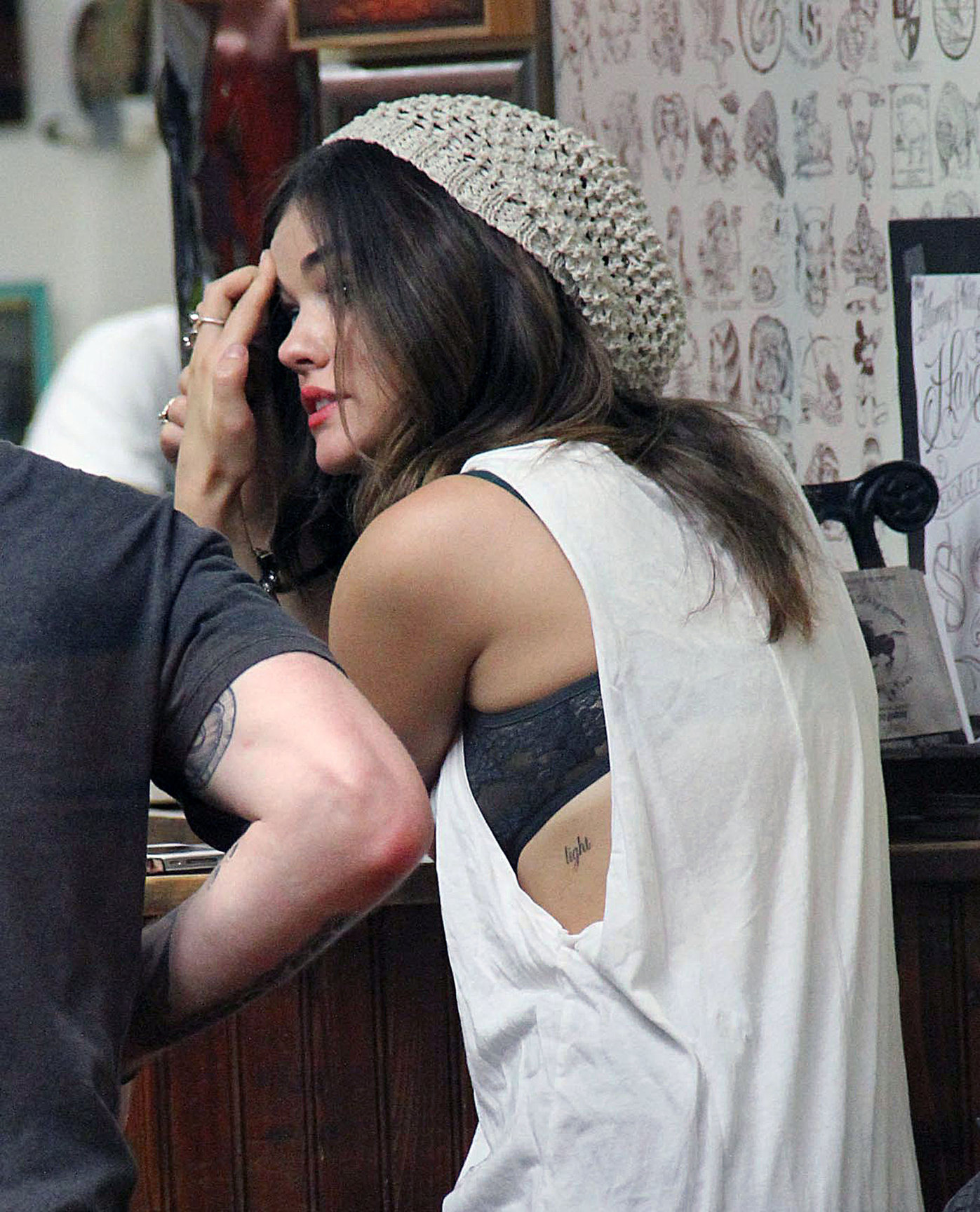 Lucy Hale - at Shamrock Tattoo - September 9th, 2012