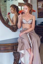 Dgil in  Anre  for SexArt - Dgil takes a sip of red wine before proceeding to stroke and finger her exquisite snatch