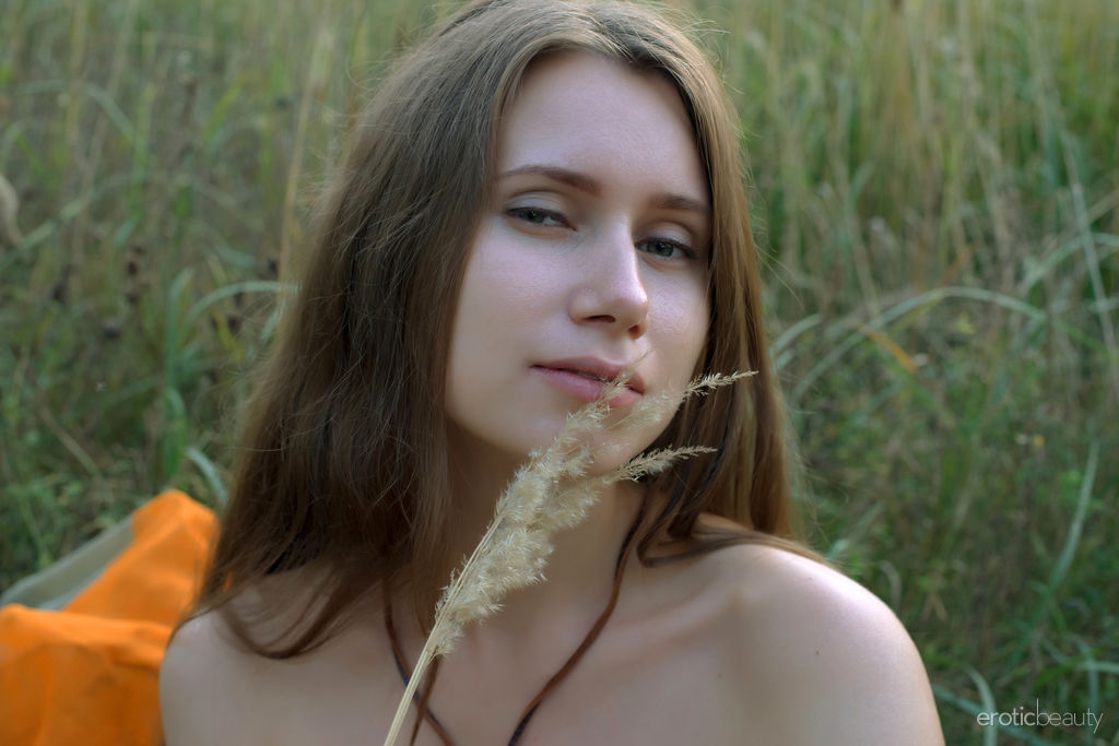 Lady Di in  The Harvest  for Erotic Beauty - Lady Di sensually poses outdoors as she flaunts her wet pussy among the grass.