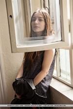 Maxima in  Andea  for MetArt - Maxima sensually strips on the chair baring her sweet pussy.