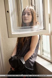 Maxima in  Andea  for MetArt - Maxima sensually strips on the chair baring her sweet pussy.