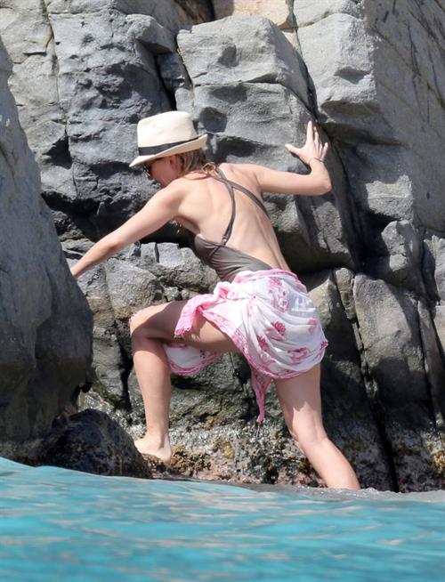 Naomi Watts wearing a swimsuit on the beach in St Barts 12/31/12 