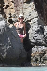 Naomi Watts wearing a swimsuit on the beach in St Barts 12/31/12 