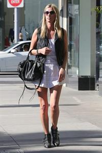Nicky Hilton in a short white dress while shopping in Beverly Hills March 1, 2013 