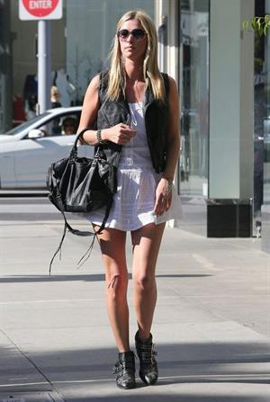Nicky Hilton in a short white dress while shopping in Beverly Hills March 1, 2013 