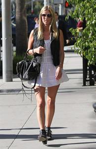 Nicky Hilton in a short white dress while shopping in Beverly Hills March 1, 2013 