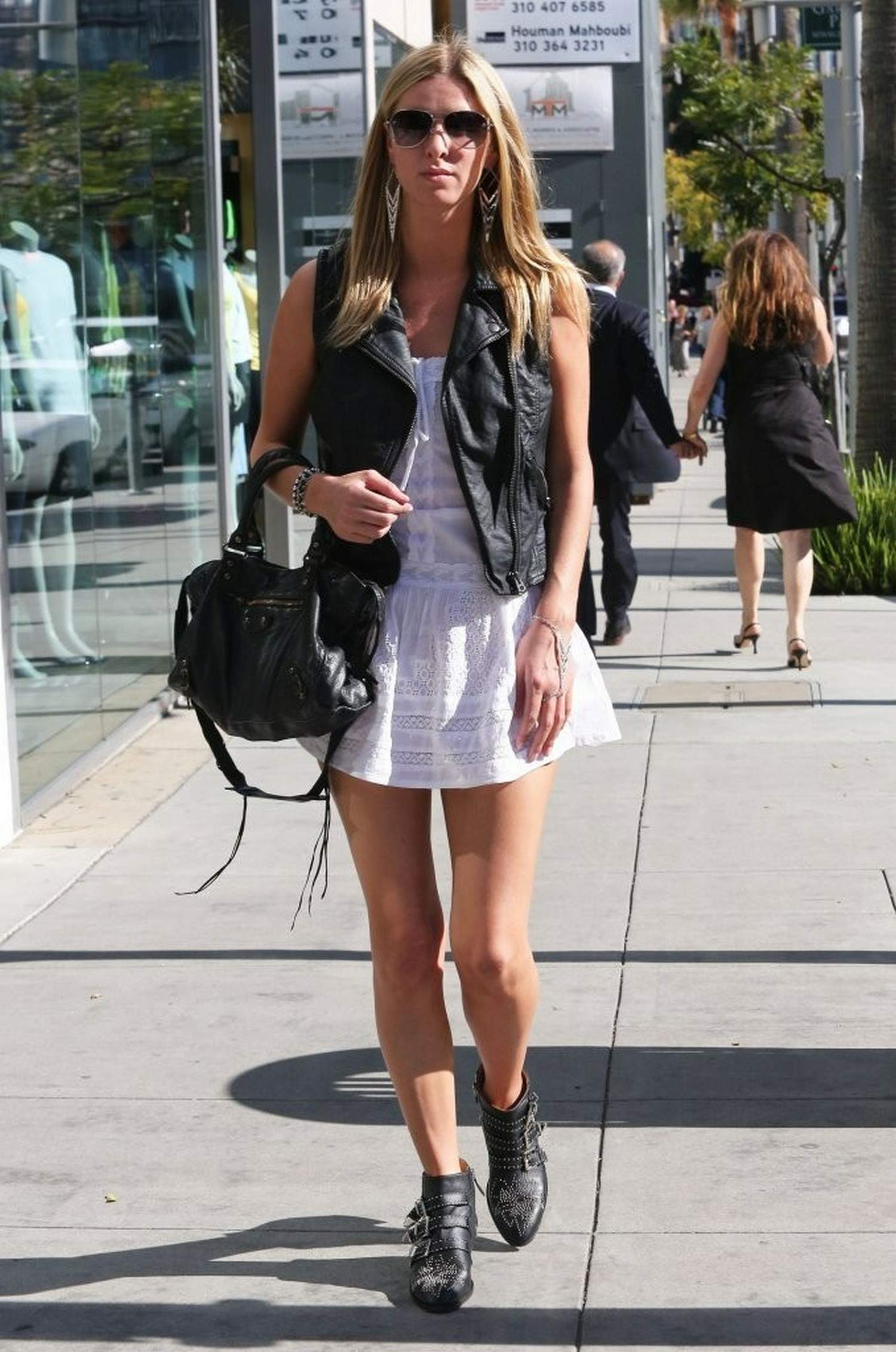 Nicky Hilton in a short white dress while shopping in Beverly Hills March 1, 2013 