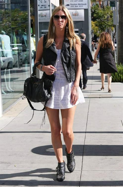 Nicky Hilton in a short white dress while shopping in Beverly Hills March 1, 2013 