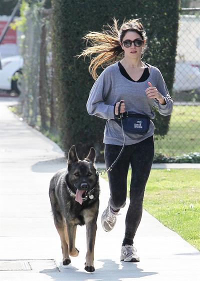 Nikki Reed jogging with her dog Enzo in Los Angeles on February 6, 2013