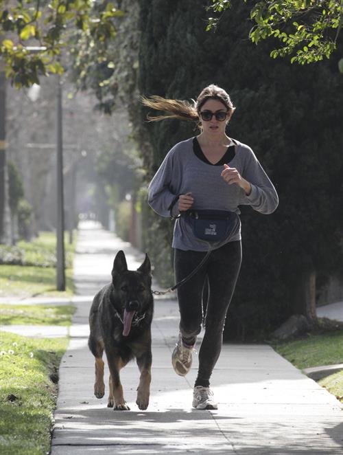 Nikki Reed jogging with her dog Enzo in Los Angeles on February 6, 2013