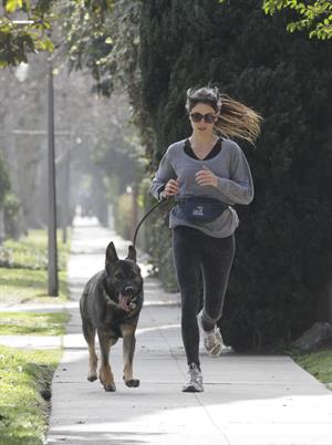 Nikki Reed jogging with her dog Enzo in Los Angeles on February 6, 2013