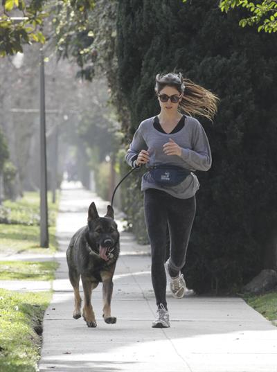 Nikki Reed jogging with her dog Enzo in Los Angeles on February 6, 2013