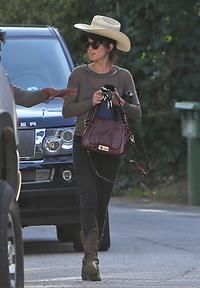 Nikki Reed walking and wearing her cowboy hat in Los Angeles on February 21, 2013