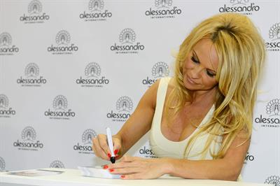Pamela Anderson  Presents Striplac Nail Polish at Beauty Fair Düsseldorf  March 15, 2013 