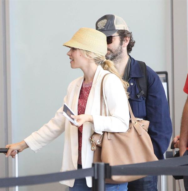 Rachel McAdams - Departs on a flight at LAX airport - August 9, 2012