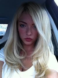 April Summers in lingerie taking a selfie