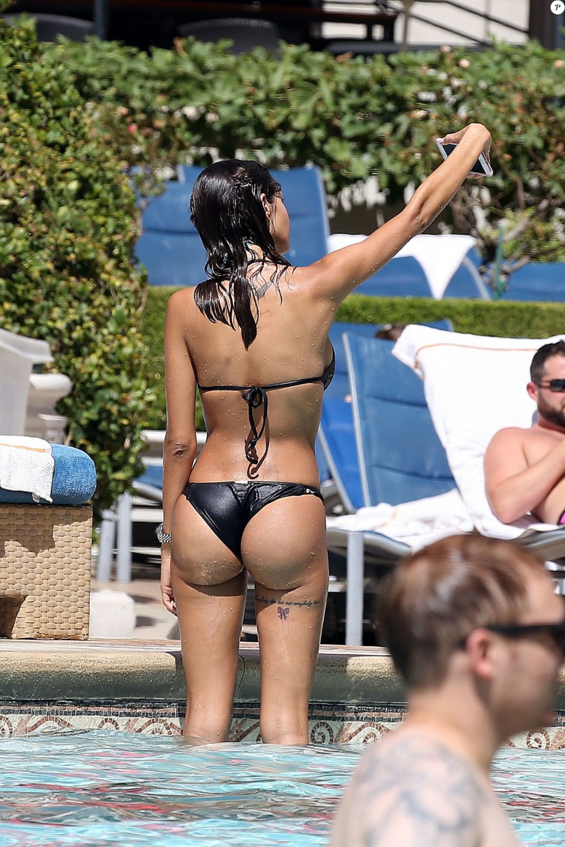 Nabilla Benattia in a bikini - ass