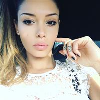 Nabilla Benattia taking a selfie