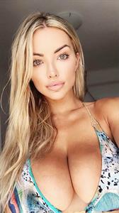 Lindsey Pelas in a bikini taking a selfie