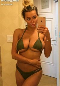 Lindsey Pelas in a bikini taking a selfie
