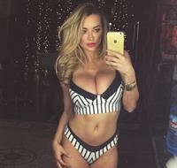 Lindsey Pelas in lingerie taking a selfie