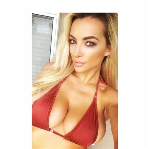 Lindsey Pelas in a bikini taking a selfie