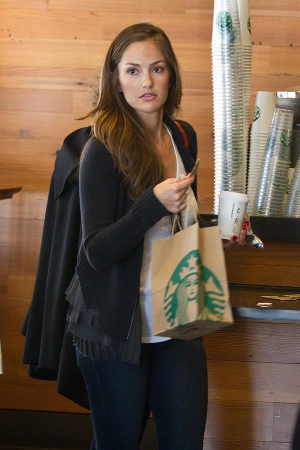 Minka Kelly outside her hotel with her morning Starbucks in New York City 8/2/2012 